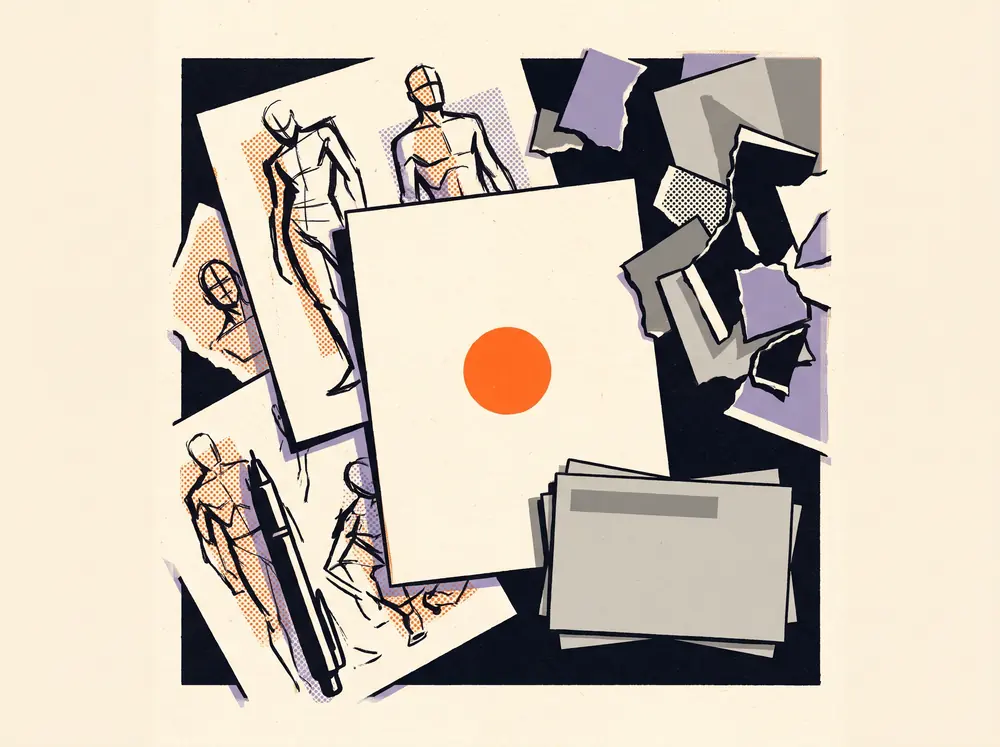 A desk seen from above, covered in loose figure studies, torn scraps and a pen, with one sheet pushed to the centre carrying a single orange marker.